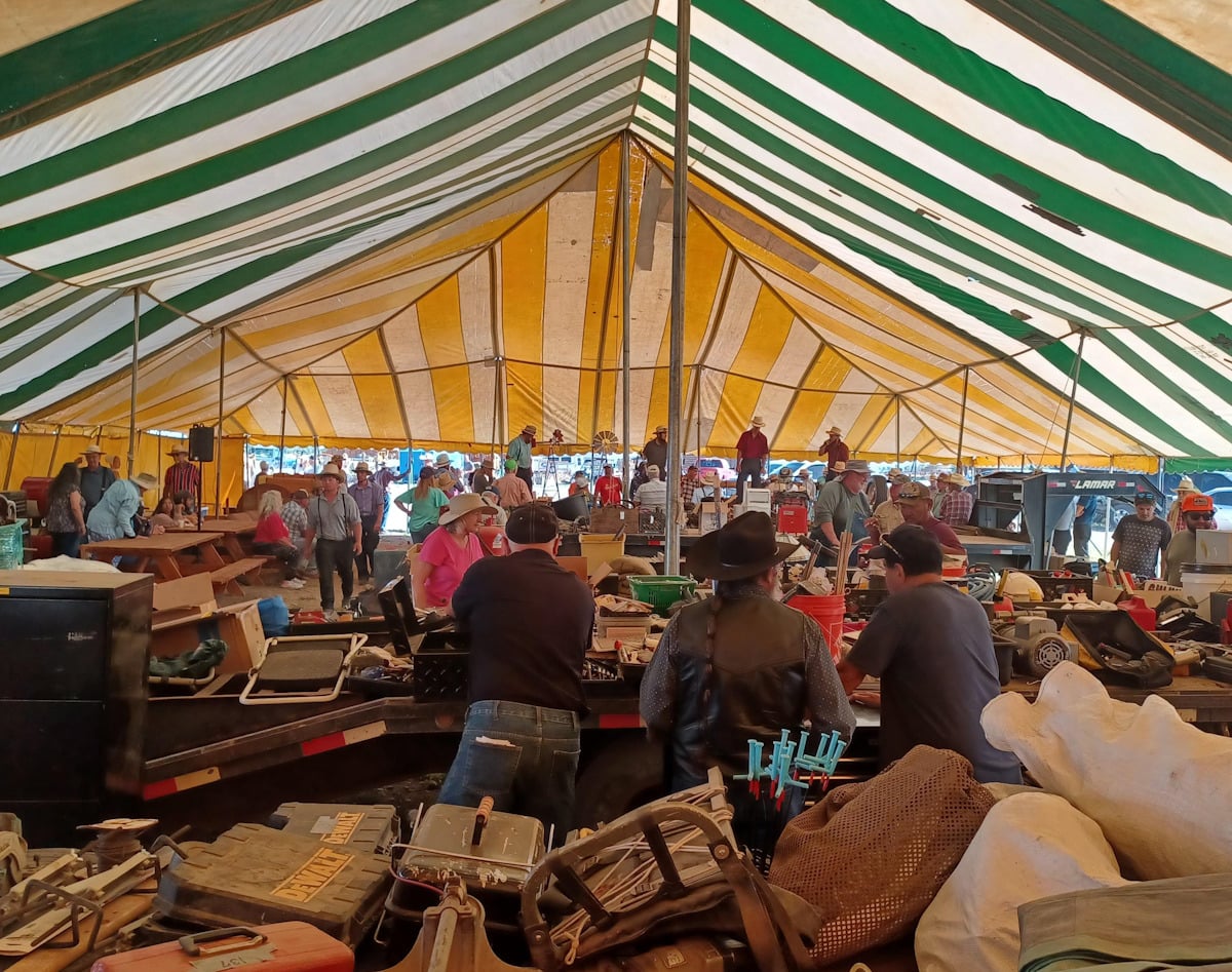 Tools and hardware for sale under tent at Amish auction