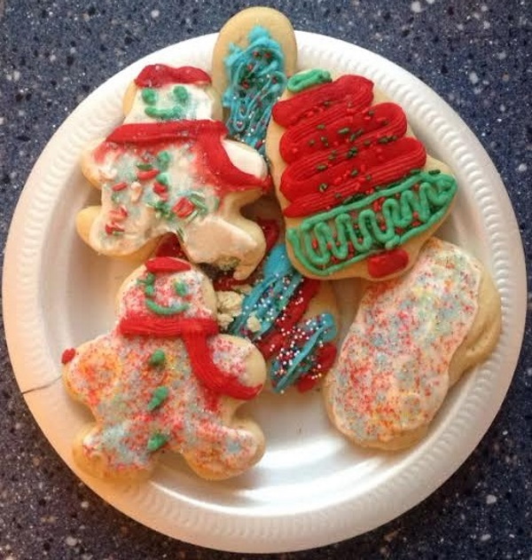 Homemade Christmas cookies in snowman and tree shapes