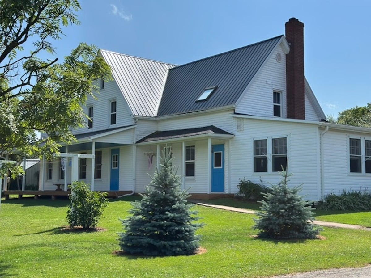 An Amish home with a steeply angled roof on Prince Edward Island, Canada