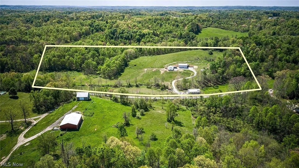 Aerial view of 20-acre Amish homestead in Cumberland Ohio with property lines marked