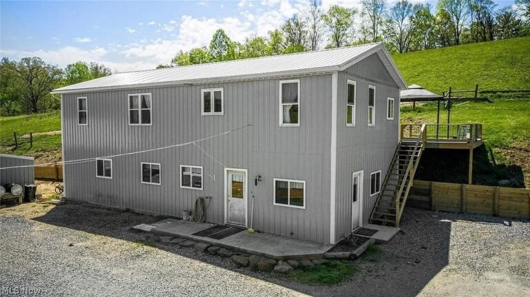 This Ultra-Functional Amish Home Looks Like a Metal Barn — Workshop Below, Home Above (29 Photos)