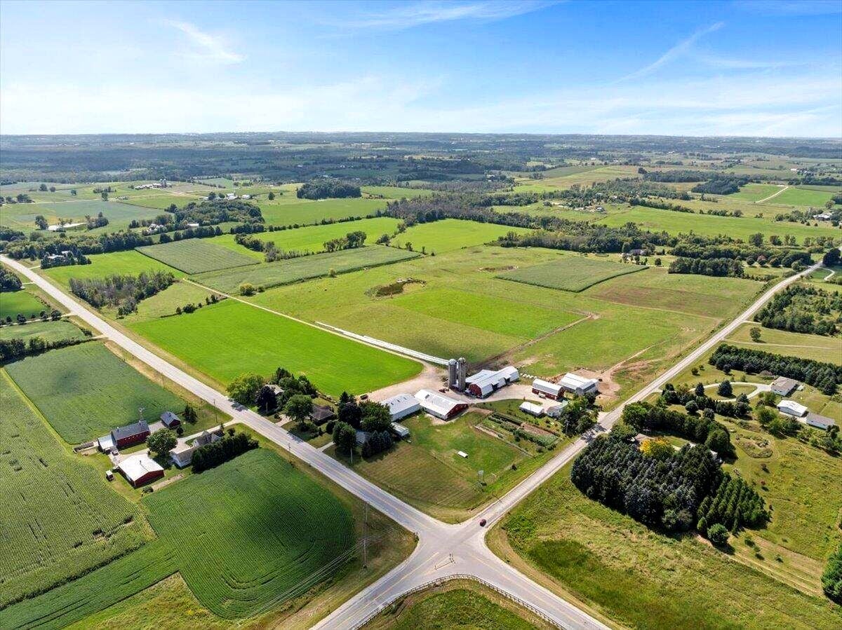 High altitude aerial view of Amish farm in Calumet County, Wisconsin surrounded by rolling farmland