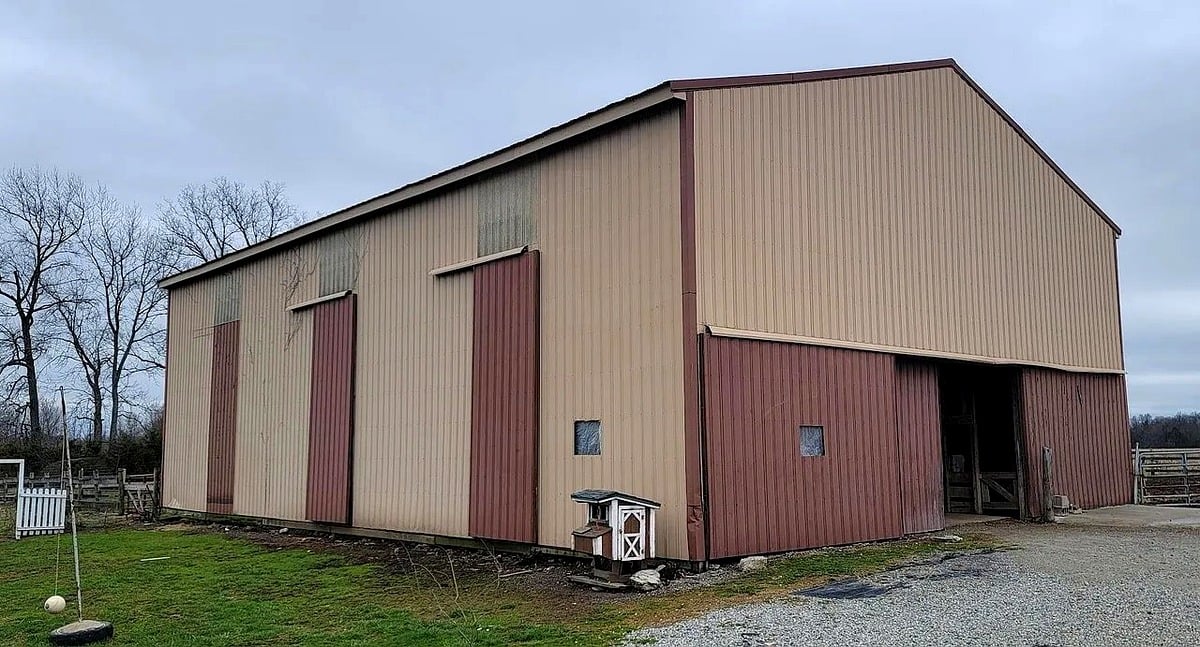 Large metal pole barn with sliding doors at Amish farm in Vevay, Indiana