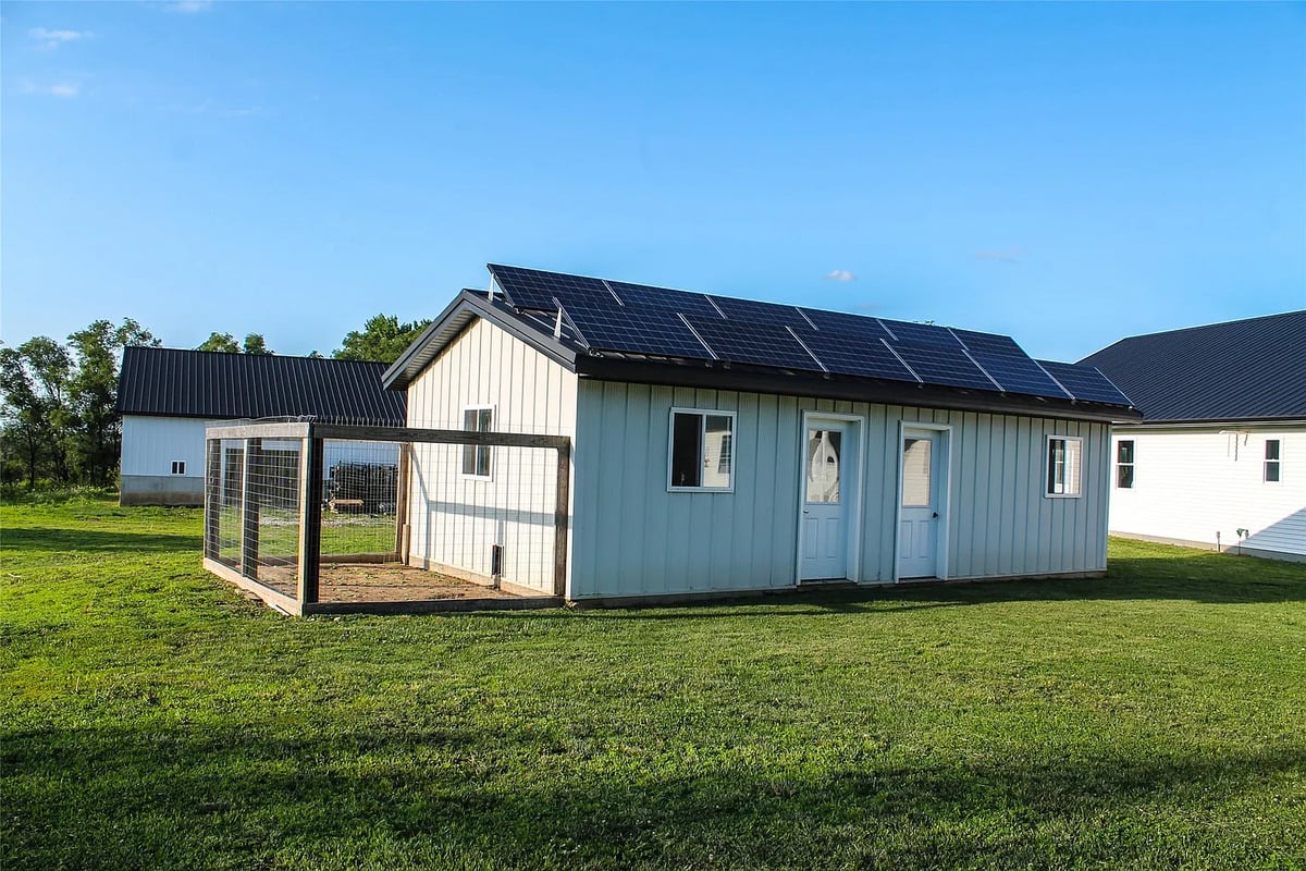 Solar-powered chicken coop at the Winterset Amish homestead Amish chicken coop with its own small solar panel array on the roof