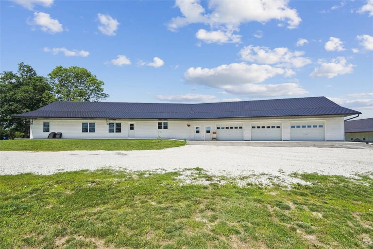 This Extra-Long Amish Home Has Solar Power, 2 Kitchens & A 3-Door Garage (24 Photos)
