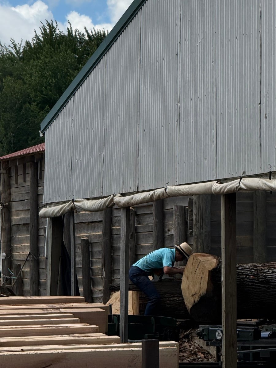 Weathered Amish sawmill building with tin roof in Cass City, Michigan