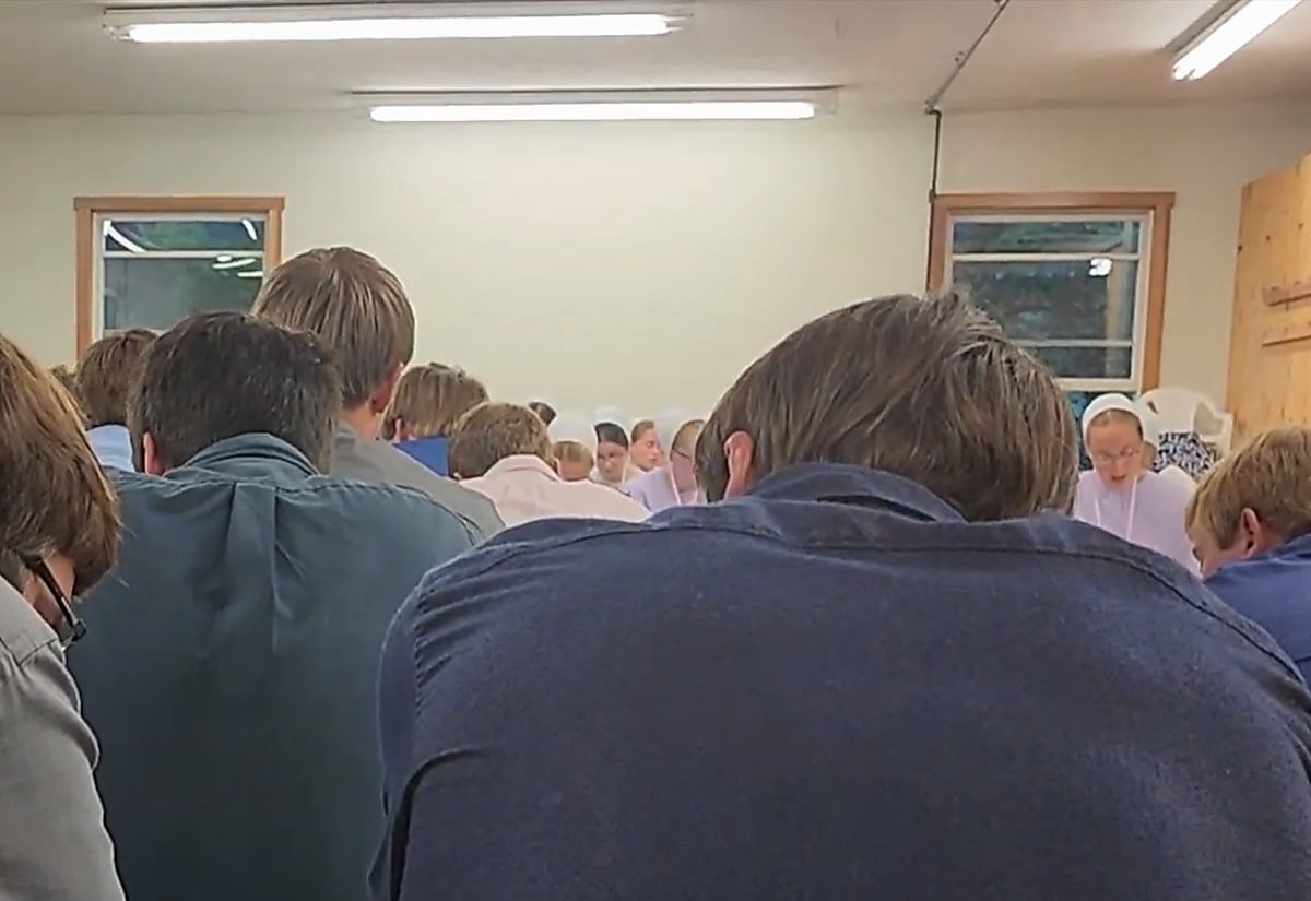 New Order Amish youth seated at a 2023 singing