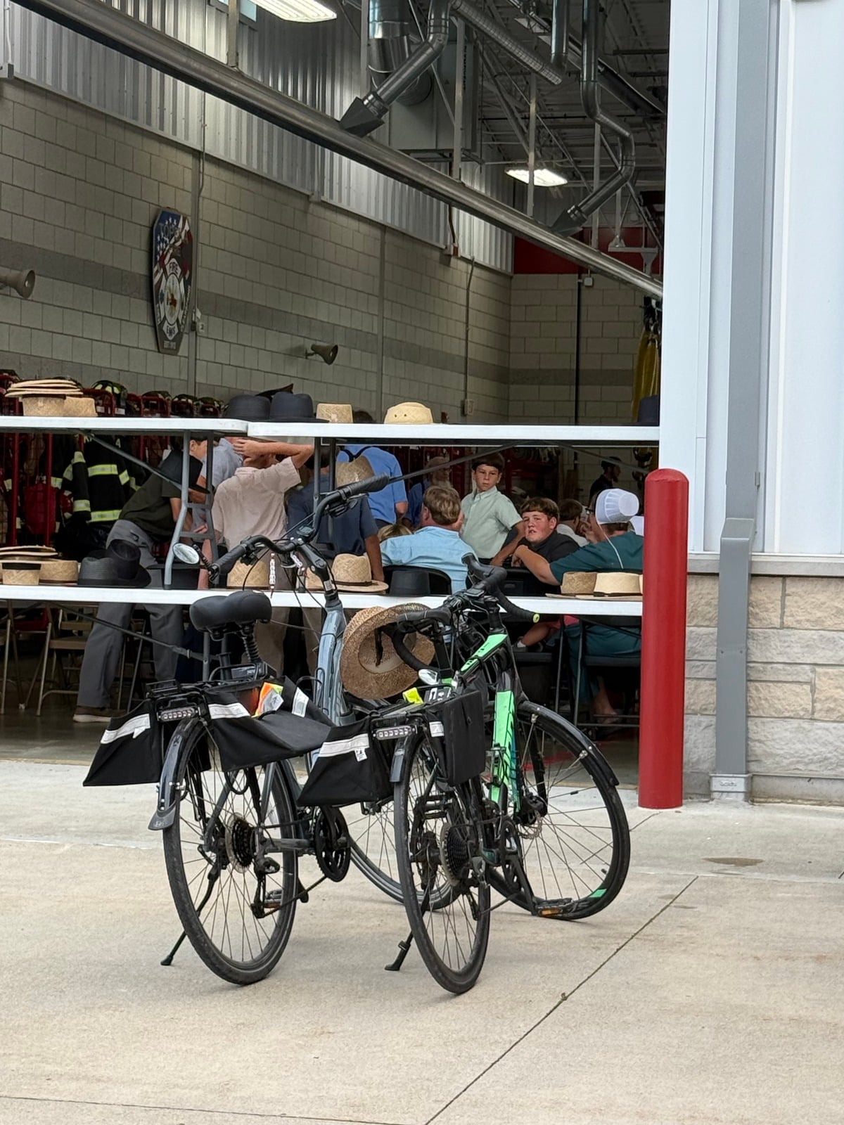 Two bicycles parked outside the Topeka fire station during the fish fry