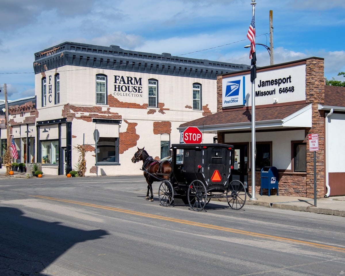 Amish buggy passing the post office in Jamesport, Missouri