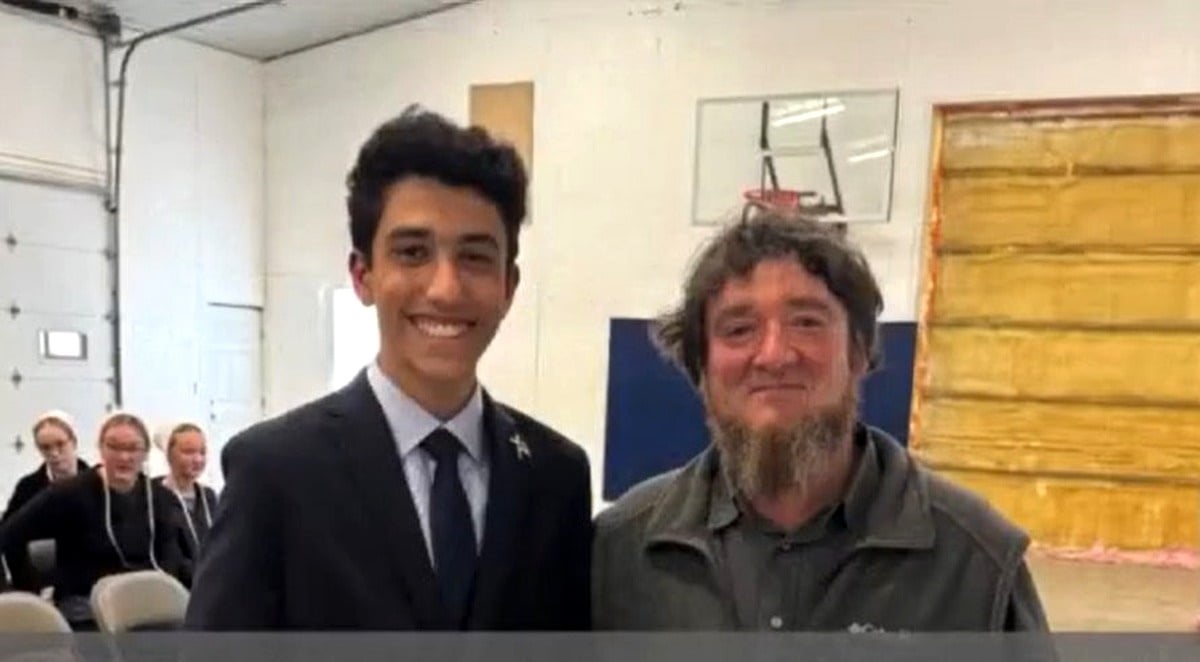 Danny Zaher with David Coblentz at the Amish community event in Vermontville, Michigan