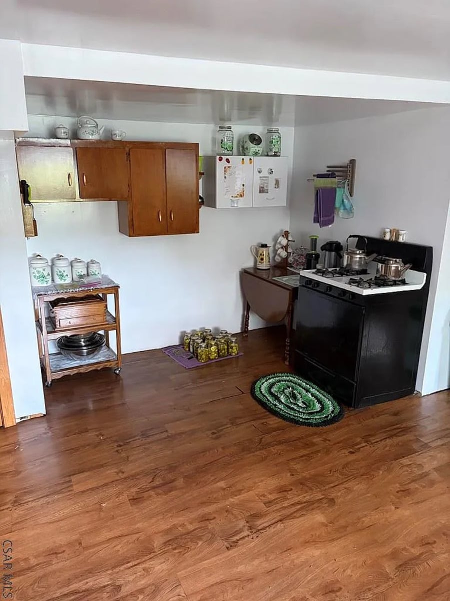 Gas range and jars of canned pickles in a Punxsutawney, PA Amish kitchen