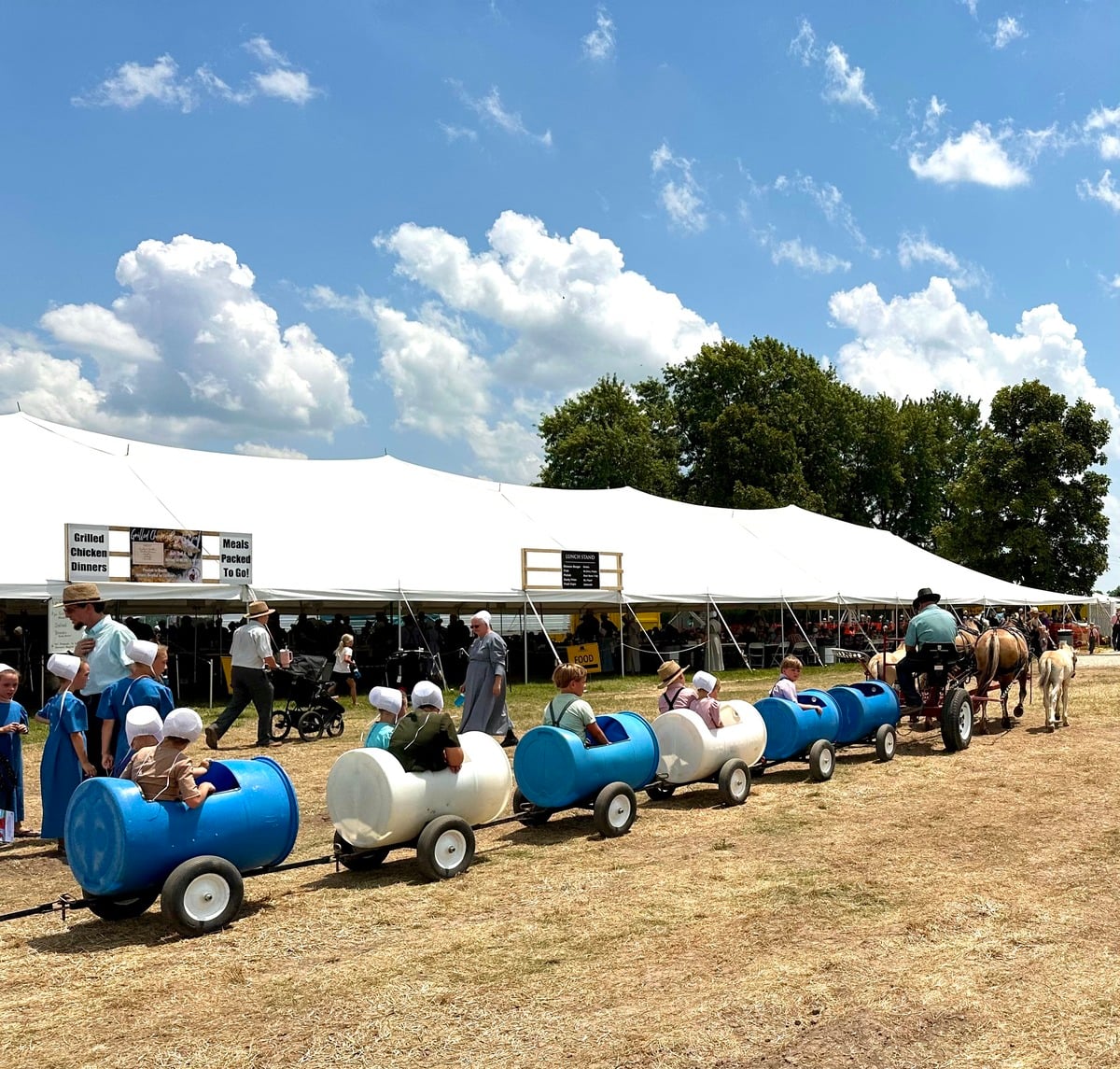 Pony Express barrel train – Horse Progress Days 2026 Amish children riding a barrel-train Pony Express at Horse Progress Days 2026