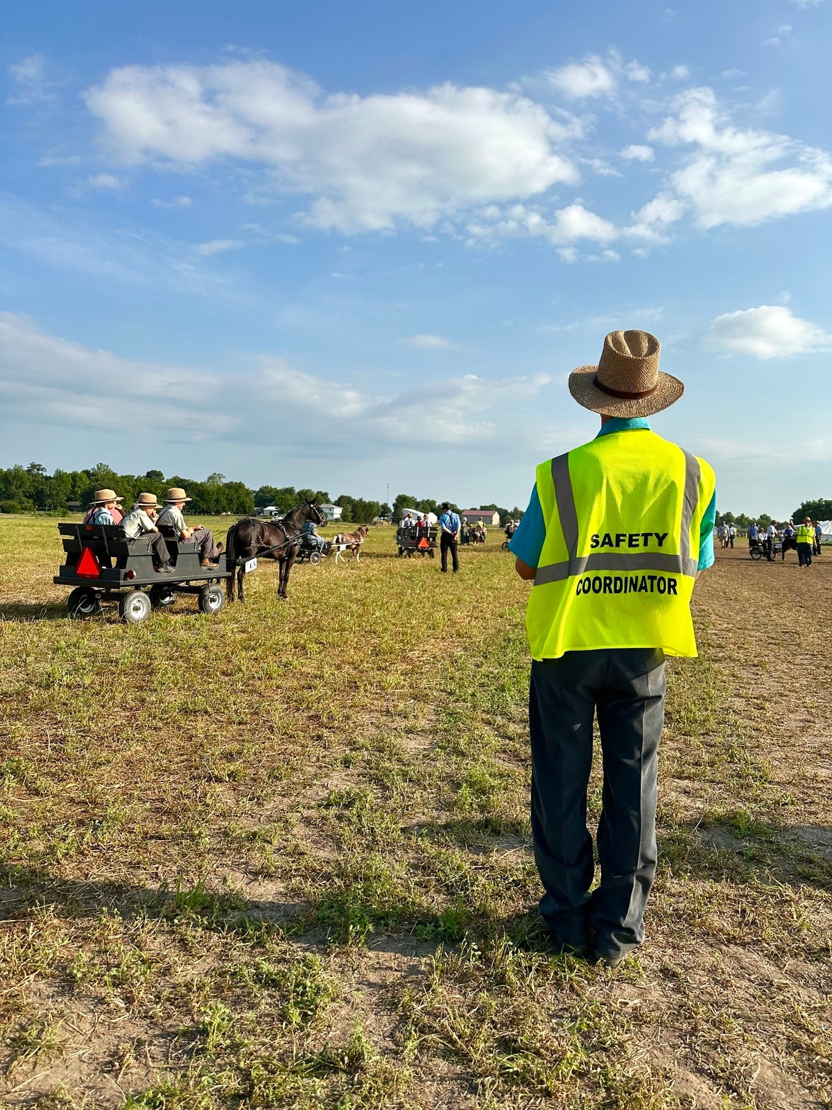 Pony Parade lineup – Horse Progress Days 2026 Amish children in pony carts waiting to enter the arena at Horse Progress Days 2026