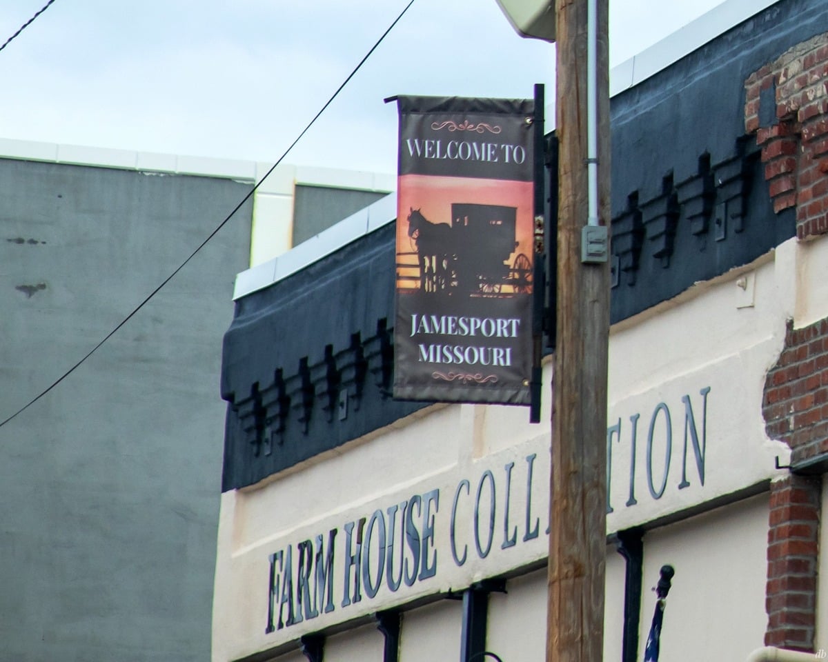 Welcome to Jamesport, Missouri banner with buggy silhouette