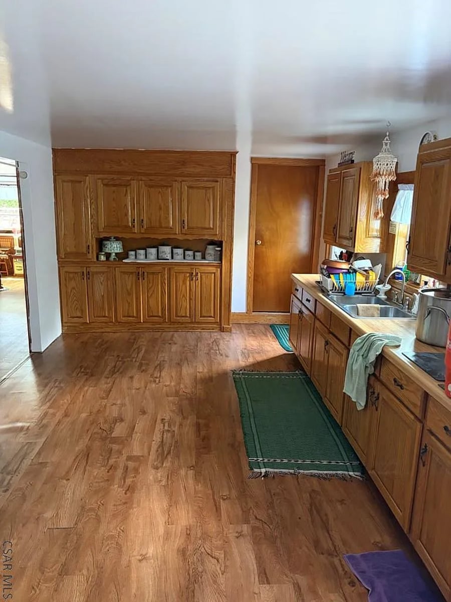 Wall of built-in oak cabinets in an Amish kitchen in Punxsutawney, Pennsylvania