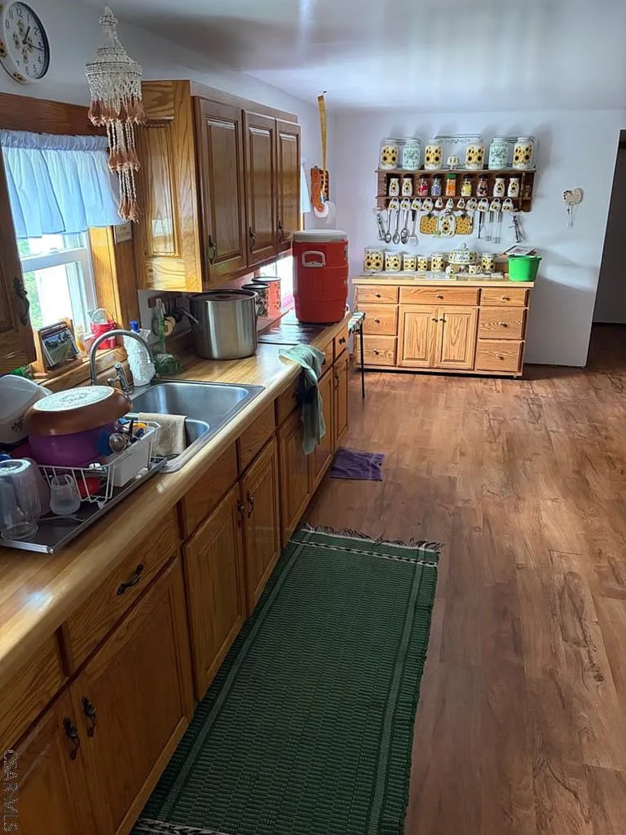 Kitchen with oak cabinets and a long counter in an Amish home in Punxsutawney, Pennsylvania
