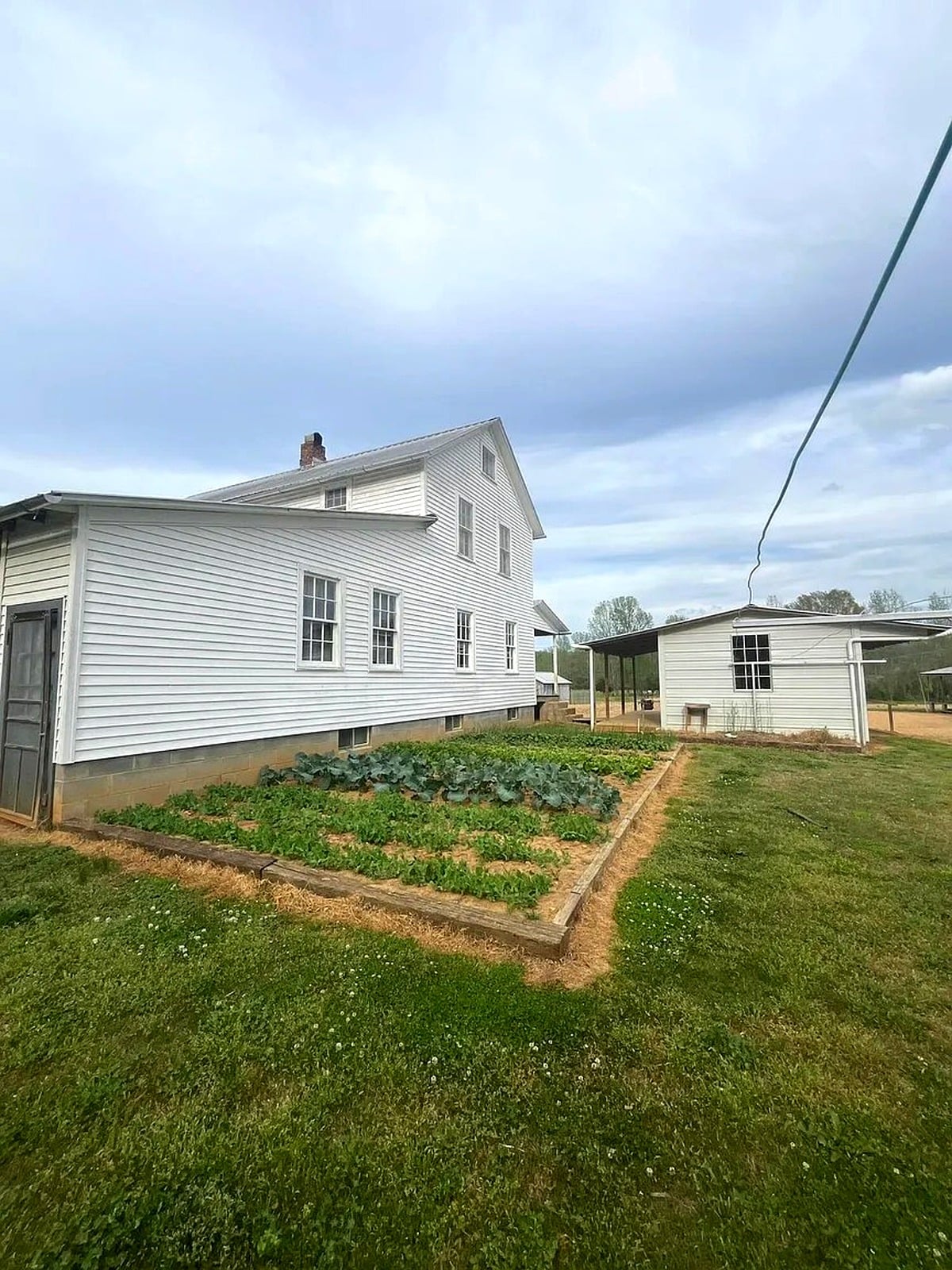 Kitchen garden alongside an Amish home in Randolph, Mississippi