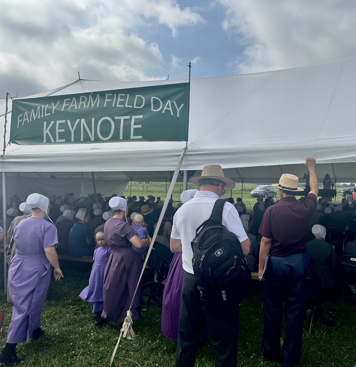 Crowd gathered under the keynote tent at the Amish Family Farm Field Days