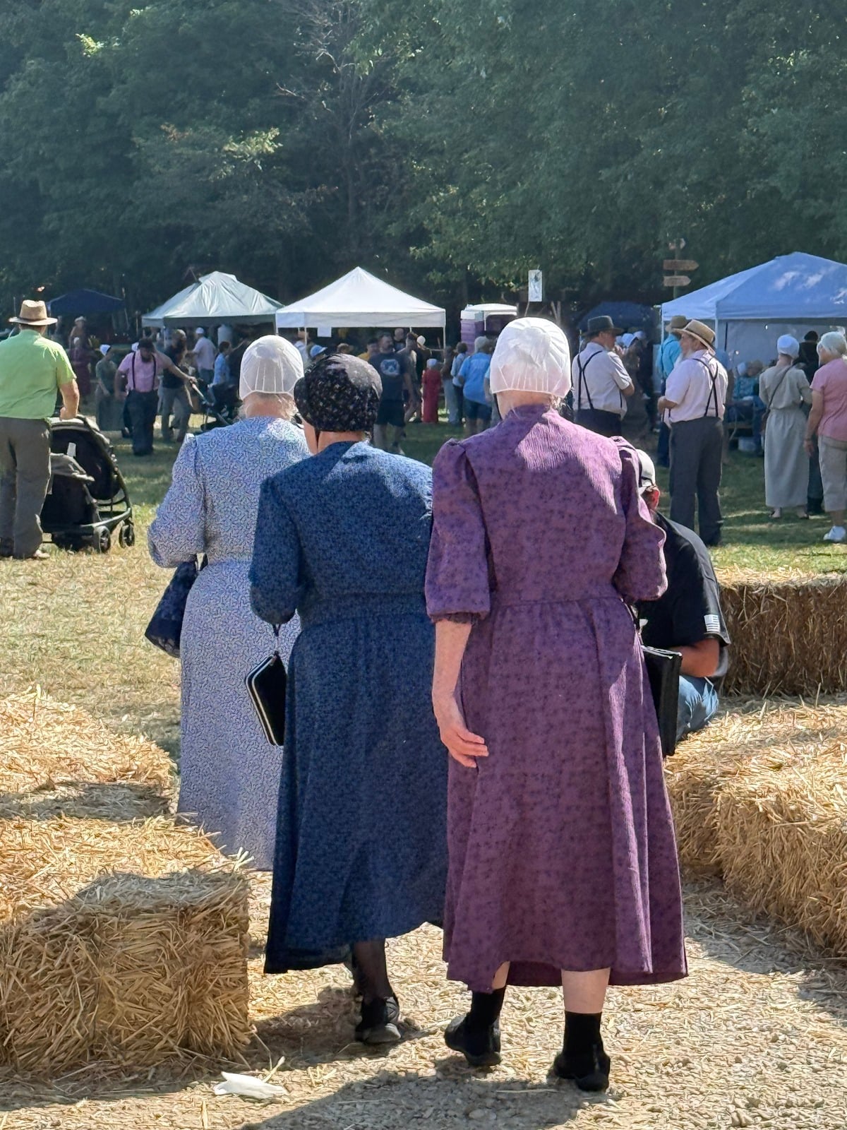 Three women walk through Rentown Old Fashion Days