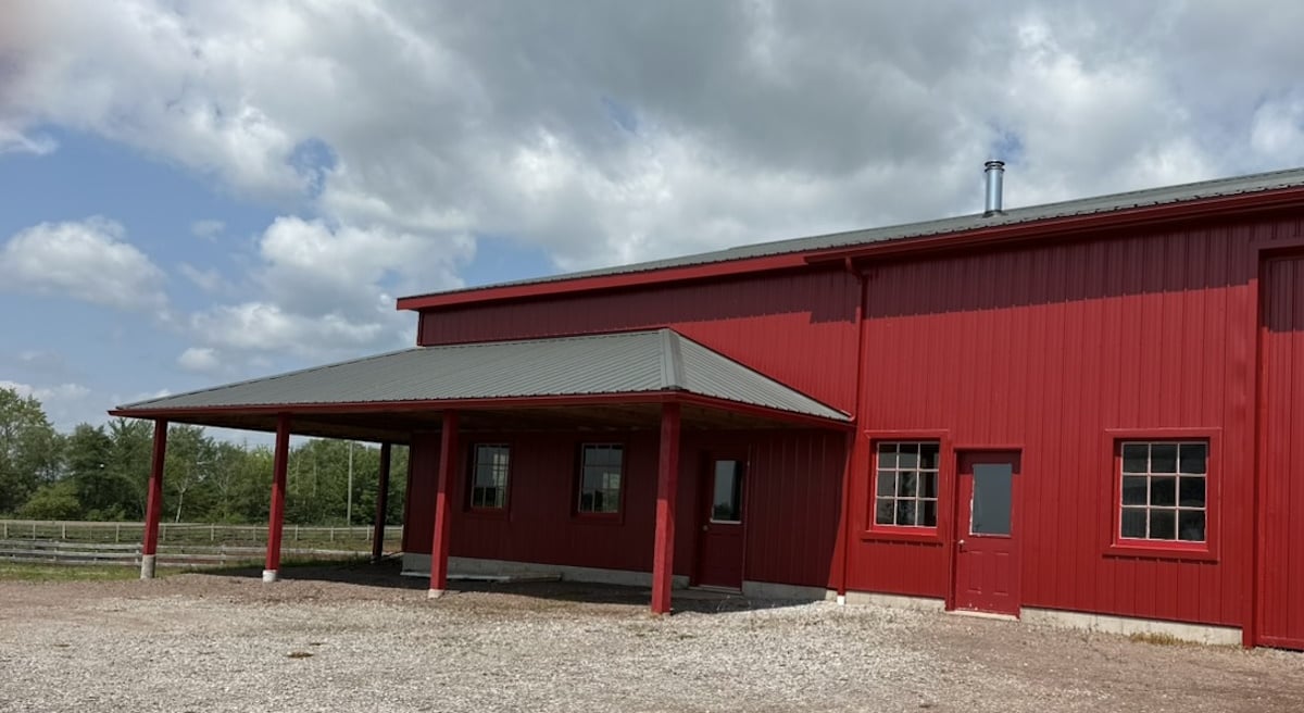 A red Amish workshop building on Prince Edward Island, Canada