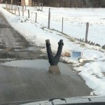 Humorous “Amish” Photo Promotes Pothole Repair